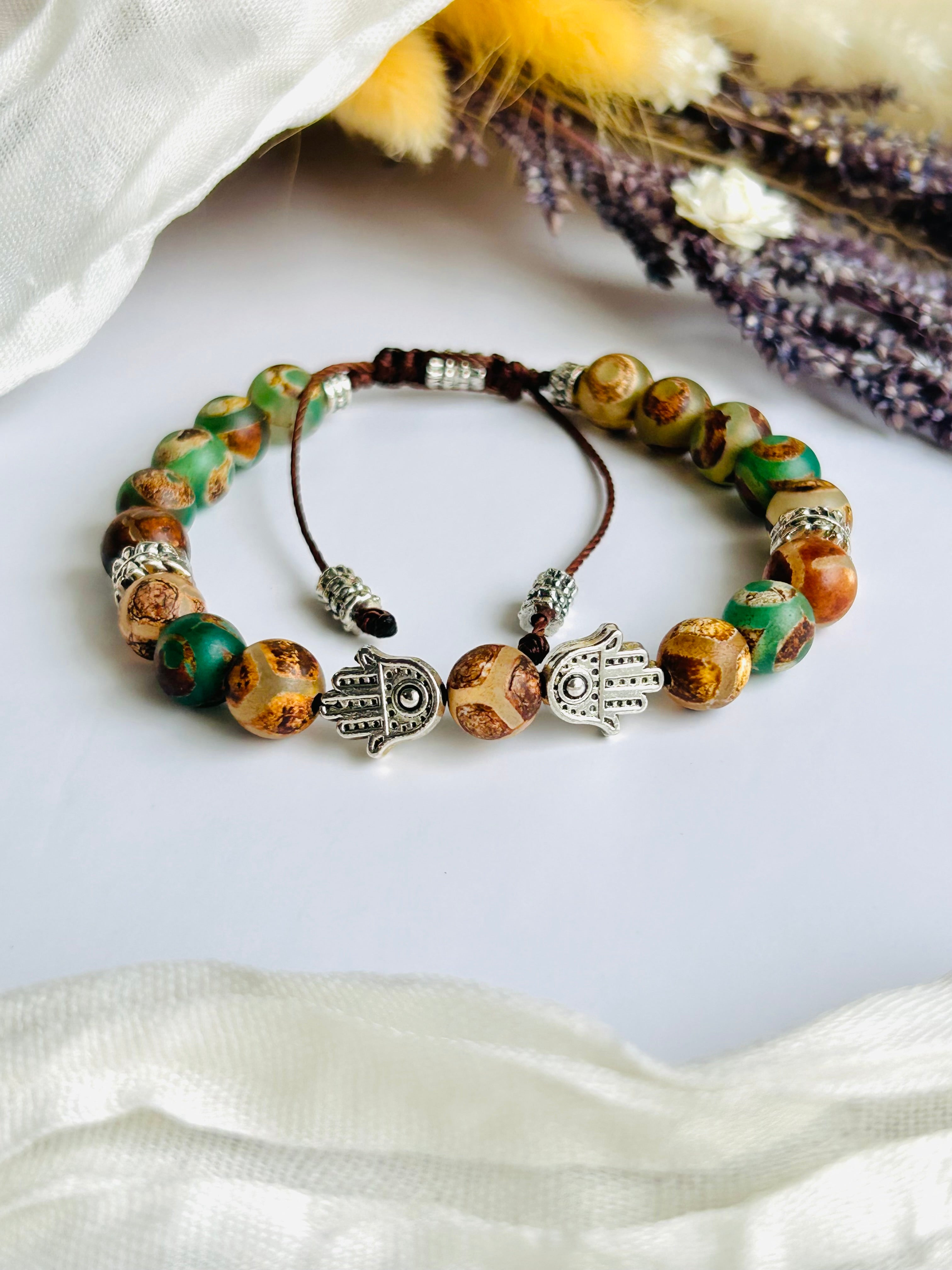Hamsa Earth Energy Bracelet - Green Tibetan Beads & Stainless Steel Hamsa Charms - Adjustable Cord Closure - Handcrafted for Protection & Positive Energy