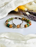 Hamsa Earth Energy Bracelet - Green Tibetan Beads & Stainless Steel Hamsa Charms - Adjustable Cord Closure - Handcrafted for Protection & Positive Energy