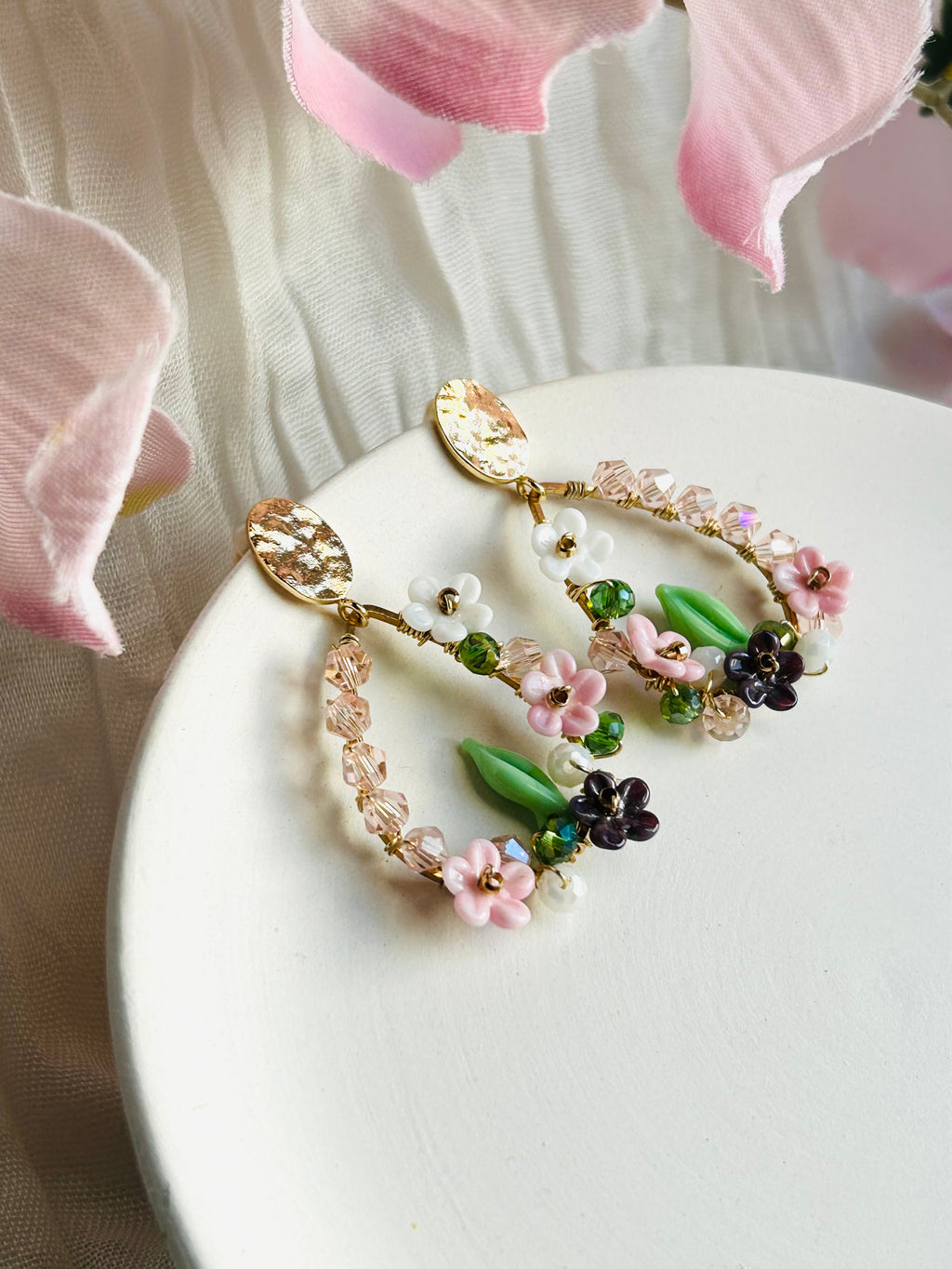 Porcelain Garden Bloom Earrings with delicate floral beads and crystal accents. Hypoallergenic, 18K gold plated, and designed to add a soft romantic touch.
