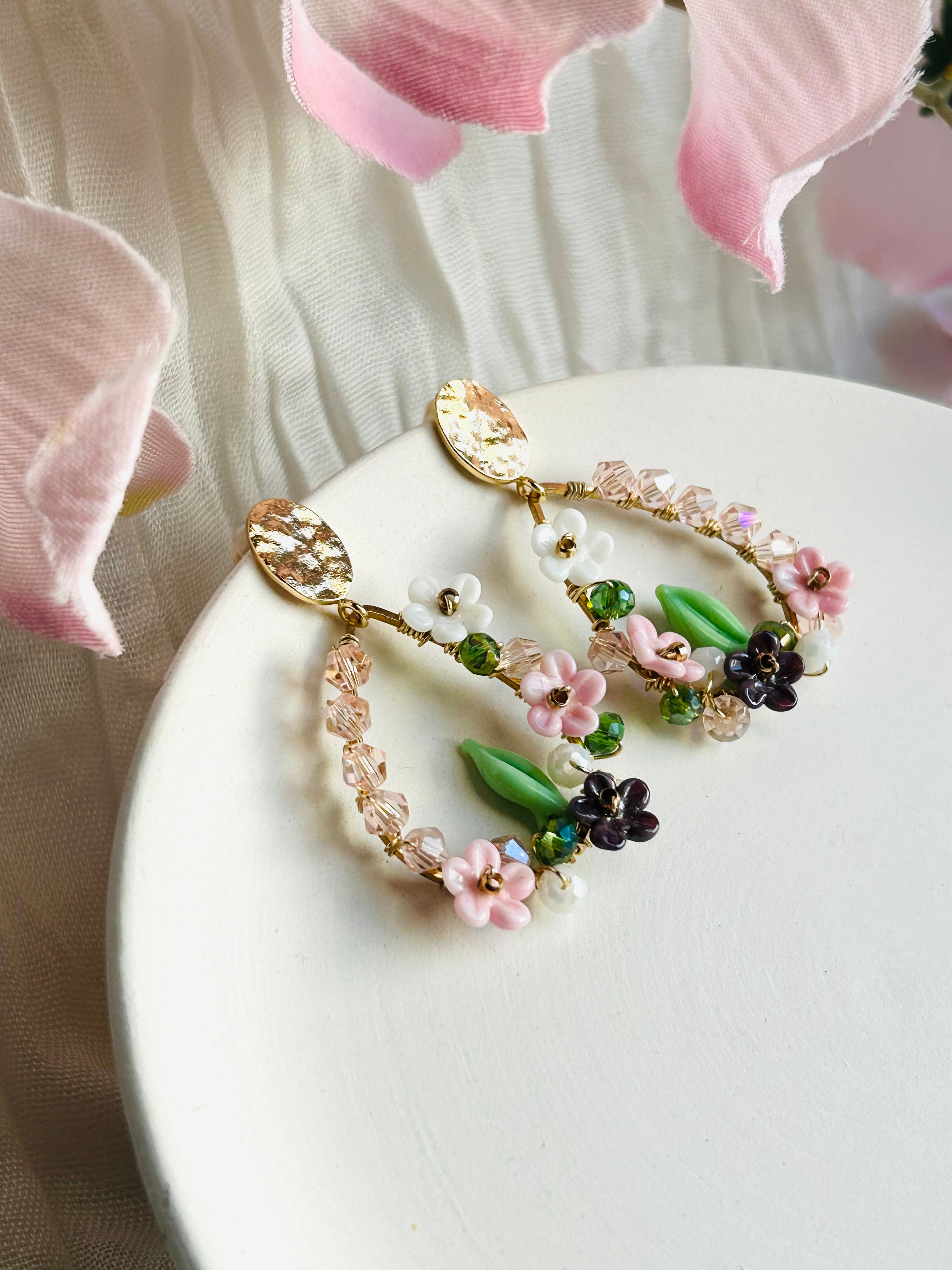 Porcelain Garden Bloom Earrings with delicate floral beads and crystal accents. Hypoallergenic, 18K gold plated, and designed to add a soft romantic touch.