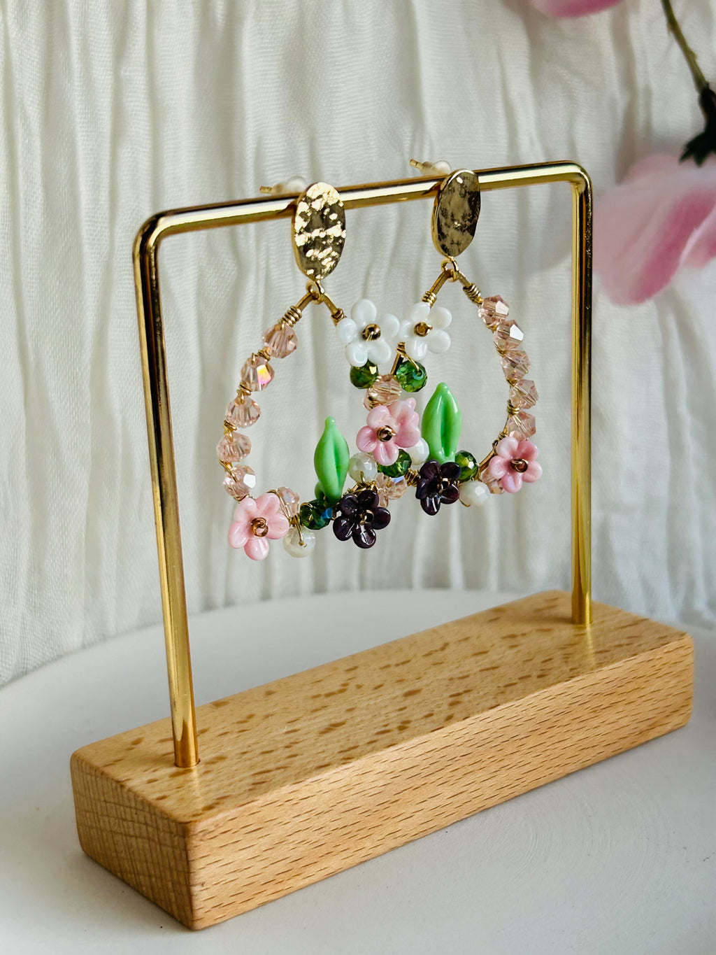 Porcelain Garden Bloom Earrings with delicate floral beads and crystal accents. Hypoallergenic, 18K gold plated, and designed to add a soft romantic touch.