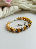 Golden Owl Intuition Bracelet Adjustable with Golden Tiger Eye Gemstones and Stainless Steel Silver Accents.
