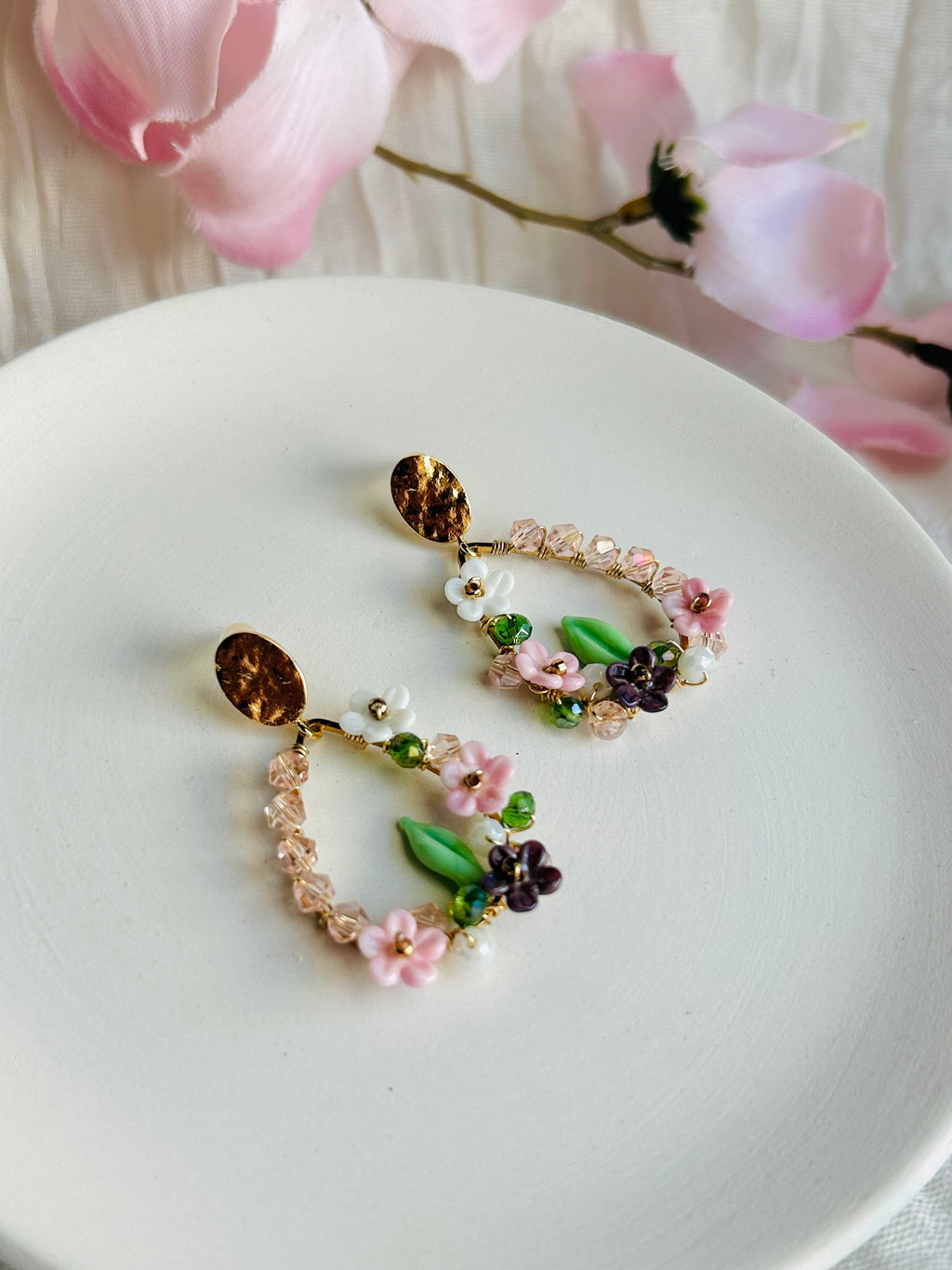 Porcelain Garden Bloom Earrings with delicate floral beads and crystal accents. Hypoallergenic, 18K gold plated, and designed to add a soft romantic touch.