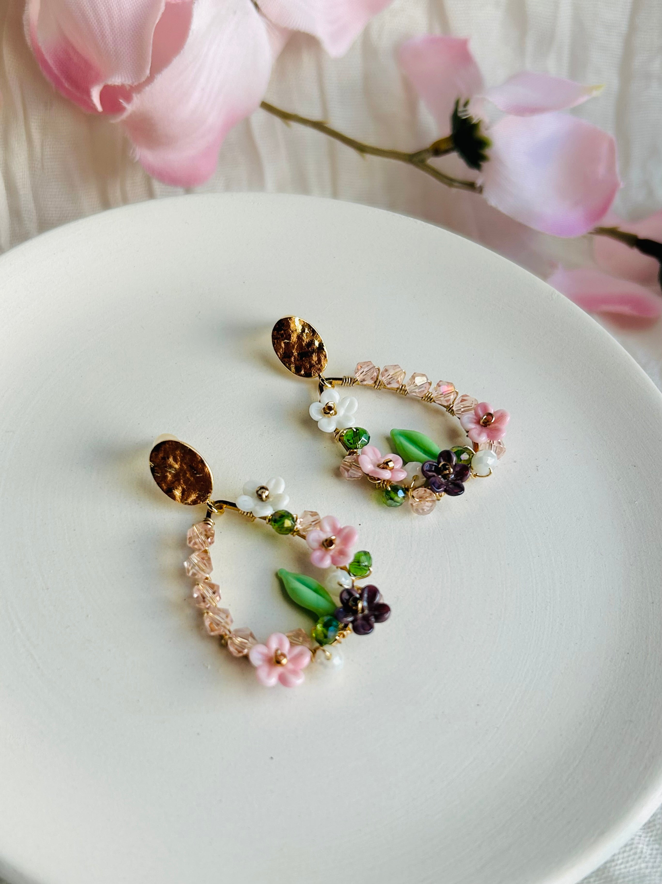 Porcelain Garden Bloom Earrings with delicate floral beads and crystal accents. Hypoallergenic, 18K gold plated, and designed to add a soft romantic touch.