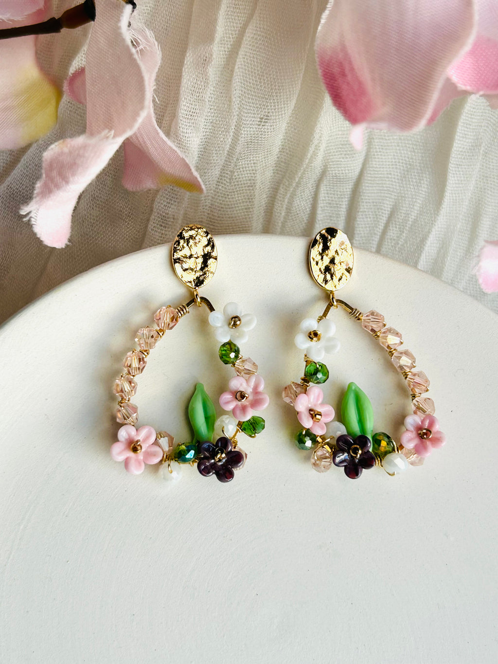 Porcelain Garden Bloom Earrings with delicate floral beads and crystal accents. Hypoallergenic, 18K gold plated, and designed to add a soft romantic touch.
