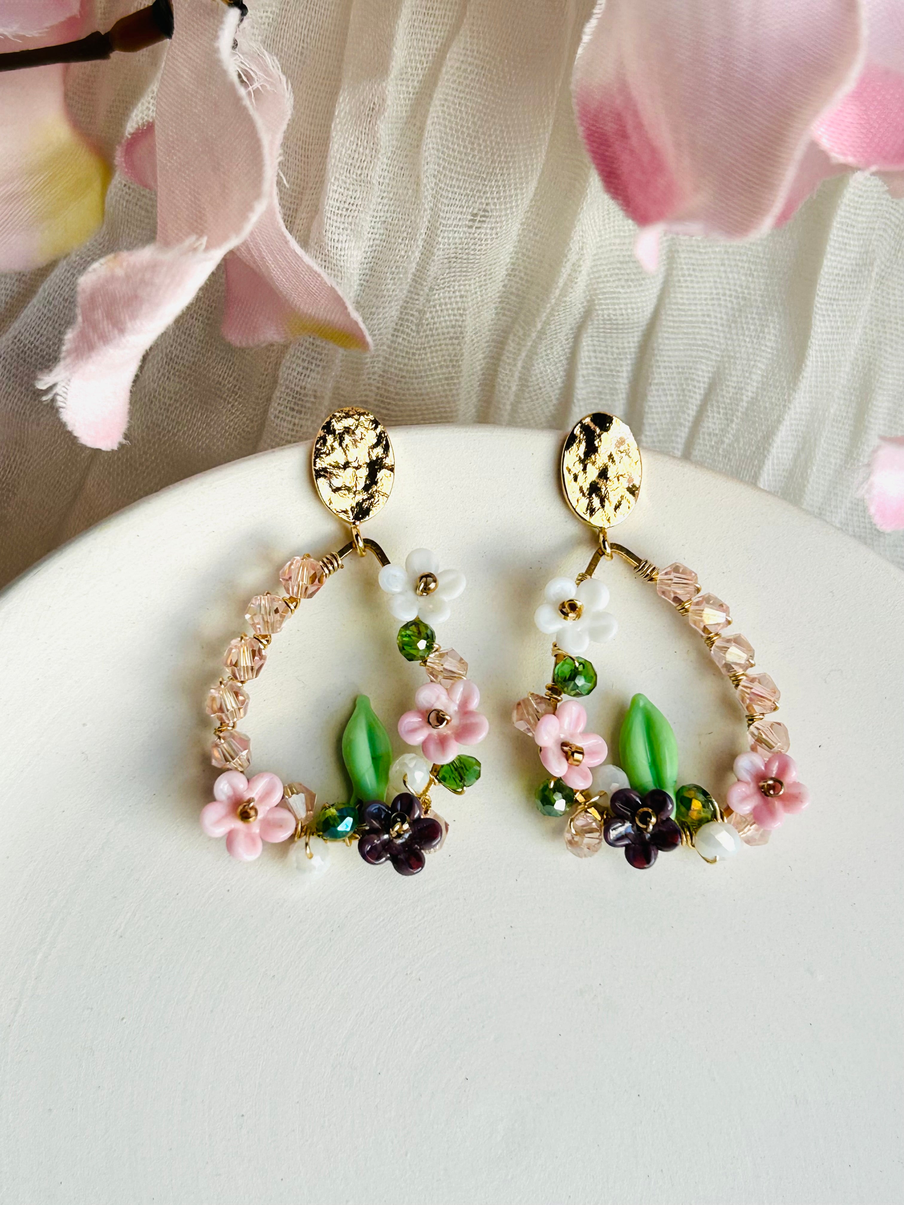 Porcelain Garden Bloom Earrings with delicate floral beads and crystal accents. Hypoallergenic, 18K gold plated, and designed to add a soft romantic touch.